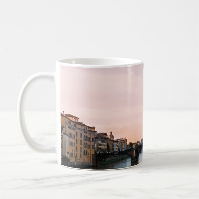 BRIDGE CROSSING RIVER IN TOWN UNDER CLOUDY SKY COFFEE MUG (Left)