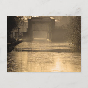Bridge in morning sun and mist postcard