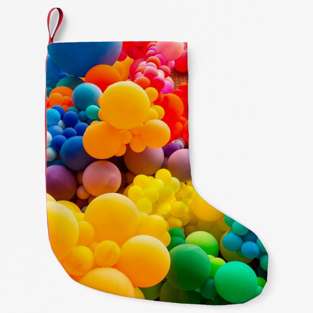 Bright abstract background of jumble of rainbow co small christmas stocking (Front)