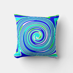 Bright blue and green swirl pattern cushion