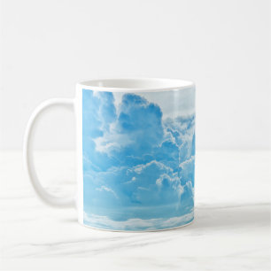 Bright blue sky, white clouds panorama. coffee mug