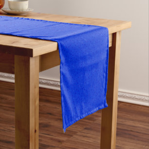Bright blue with small polka dots. short table runner