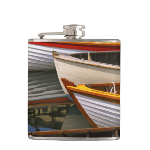 Bright coloured boats at the Wooden Boat Centre Hip Flask