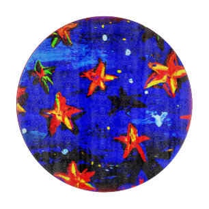 Bright Coloured Orange Stars. Buy Now Cutting Board
