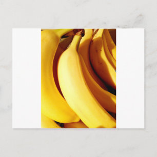 Bright fresh yellow bunch of ripe bananas postcard