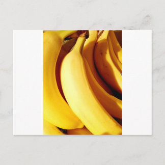 Bright fresh yellow bunch of ripe bananas postcard