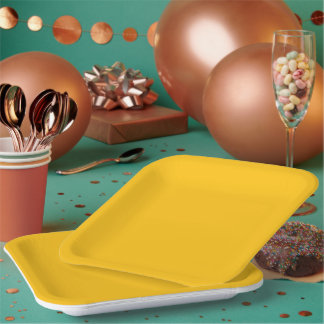Bright golden-yellow background with subtle paper plate