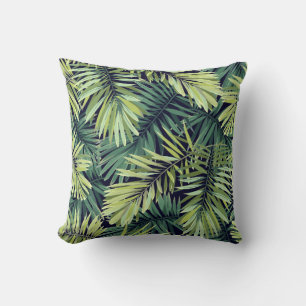 Bright green background with tropical plants. Seam Cushion
