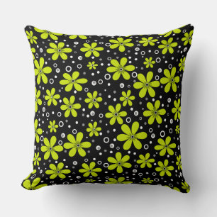 Bright green neon floral pattern on black backgrou cushion