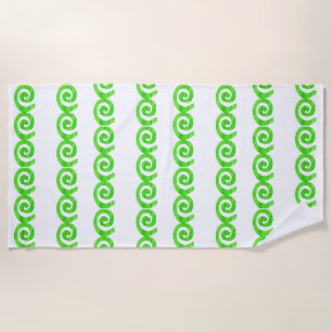 Bright green spirals pattern on white beach towel