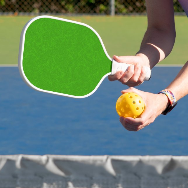 Bright green textured surface  swirling pattern pickleball paddle (Insitu)