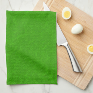 Bright green textured surface swirling pattern tea towel