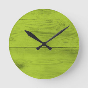Bright green wood structure as a background textur round clock