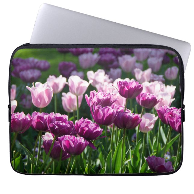Bright lilac and pink tulips on a sunny day  laptop sleeve (Front)