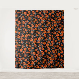 Bright orange flowers on a black background with w tapestry