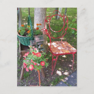 Bright orange garden chair postcard