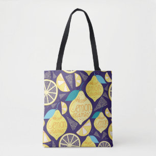 Bright pattern of lemons and cloves on a dark blue tote bag