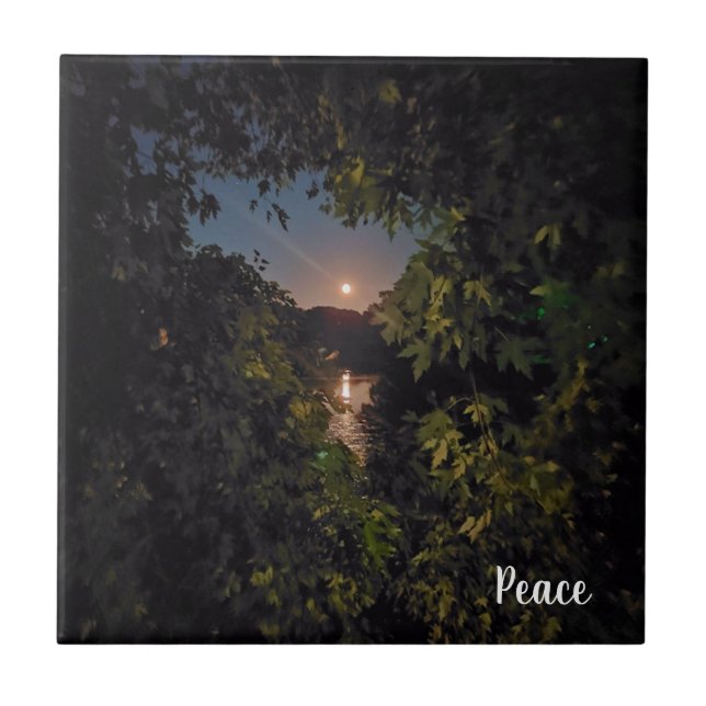 Bright pink moon glow over calm water ceramic tile (Front)