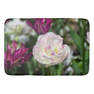 Bright pink tulips on a sunny day bath mat