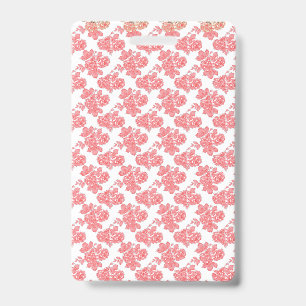 Bright red and pink floral wrapping paper featurin ID badge