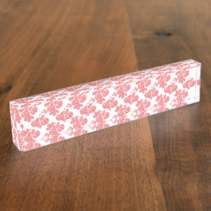 Bright red and pink floral wrapping paper featurin nameplate
