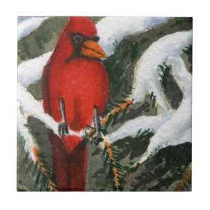 Bright red Cardinal in a snow covered pine Ceramic Tile