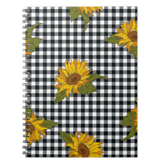 Bright sunflowers on a black and white buffalo che notebook