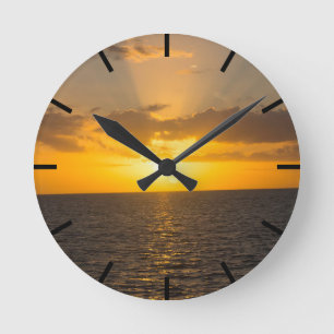Bright Sunset on the Ocean Round Clock