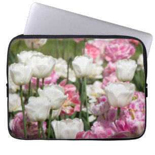Bright white and pink tulips on a sunny day laptop sleeve