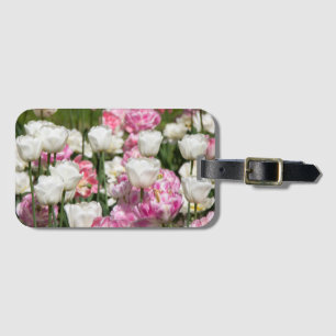 Bright white and pink tulips on a sunny day luggage tag