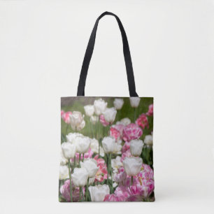 Bright white and pink tulips on a sunny day tote bag