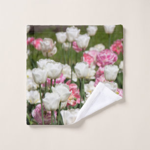 Bright white and pink tulips on a sunny day wash cloth