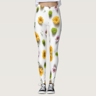 Bright yellow and pink zinnia on white background leggings