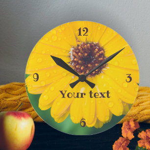 Bright yellow flower after rain round clock