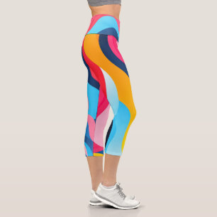 Brightly coloured wavy lines background capri leggings
