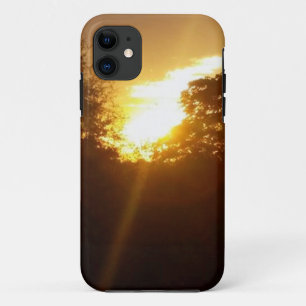 Brilliant sunrise over the trees iPhone 11 case