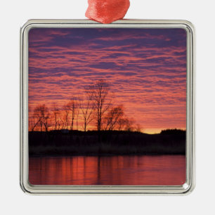Brilliant sunset reflects into the Calamus River Metal Ornament