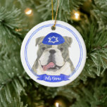 Brindle & White English Bulldog Hanukkah Ceramic Ornament<br><div class="desc">Celebrate your favourite mensch on a bench with a personalised ornament! This design features a sweet illustration of a brindle and white english bulldog dog with a blue and white yarmulke. For the most thoughtful gifts, pair it with another item from my collection! To see more work and learn about...</div>