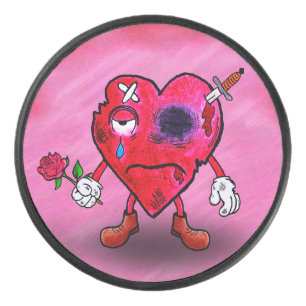 Broken heart hockey puck