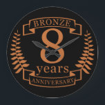Bronze eighth wedding anniversary 8 years large clock<br><div class="desc">A design to celebrate 8 years of marriage. This design has a tan (bronze) coloured laurel design on a black background. Bronze is the traditional gift for this occasion, USA. The text reads BRONZE 8 years anniversary. A romantic design to celebrate your 8th year of marriage. If you would like...</div>