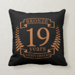 Bronze traditional wedding anniversary 19 years cushion<br><div class="desc">A design to celebrate 19 years of marriage. This design has a bronze coloured laurel design on a black background. Bronze is the traditional gift for this occasion. The text reads bronze 19 years anniversary. A romantic design to celebrate your 19th year of marriage. If you would like any help...</div>