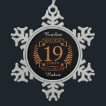 Bronze traditional wedding anniversary 19 years snowflake pewter christmas ornament<br><div class="desc">A design to celebrate 19 years of marriage. This design has a bronze coloured laurel design on a black background. Bronze is the traditional gift for this occasion. The text reads bronze 19 years anniversary. A romantic design to celebrate your 19th year of marriage. If you would like any help...</div>