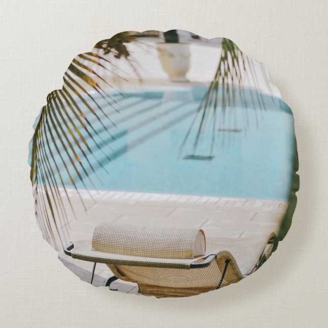 Brown and black armchair beside swimming pool in t round cushion (Front)