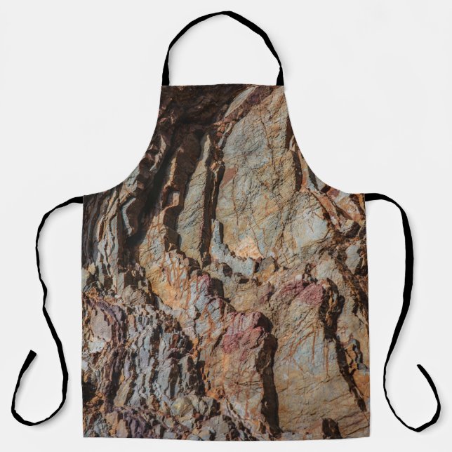 Brown and black rock formation apron (Front)