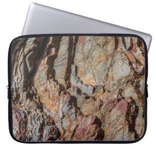 Brown and black rock formation laptop sleeve