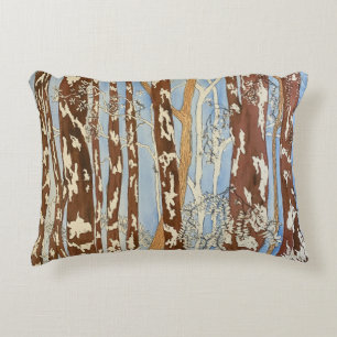 brown and blue forest painting pillow