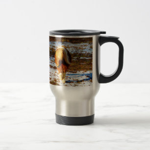 Brown and cream miniature horse in the snow. travel mug
