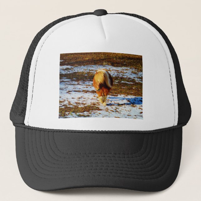 Brown and cream miniature horse in the snow. trucker hat (Front)