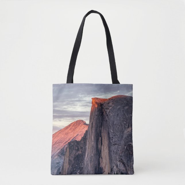 BROWN AND GRAY ROCK FORMATION UNDER GRAY CLOUDS TOTE BAG (Front)