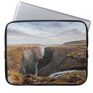 BROWN AND GRAY ROCKY MOUNTAIN UNDER GRAY CLOUDS LAPTOP SLEEVE